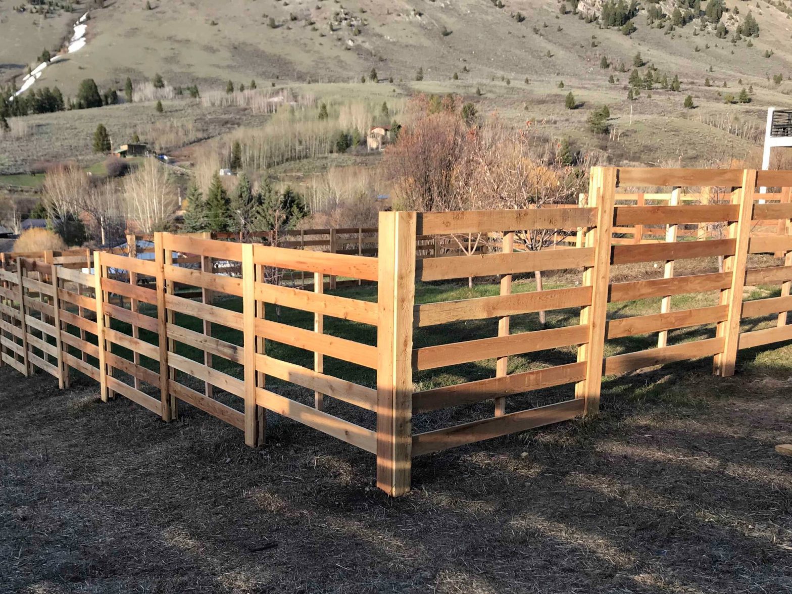Photo of a wooden cedar open panel fence