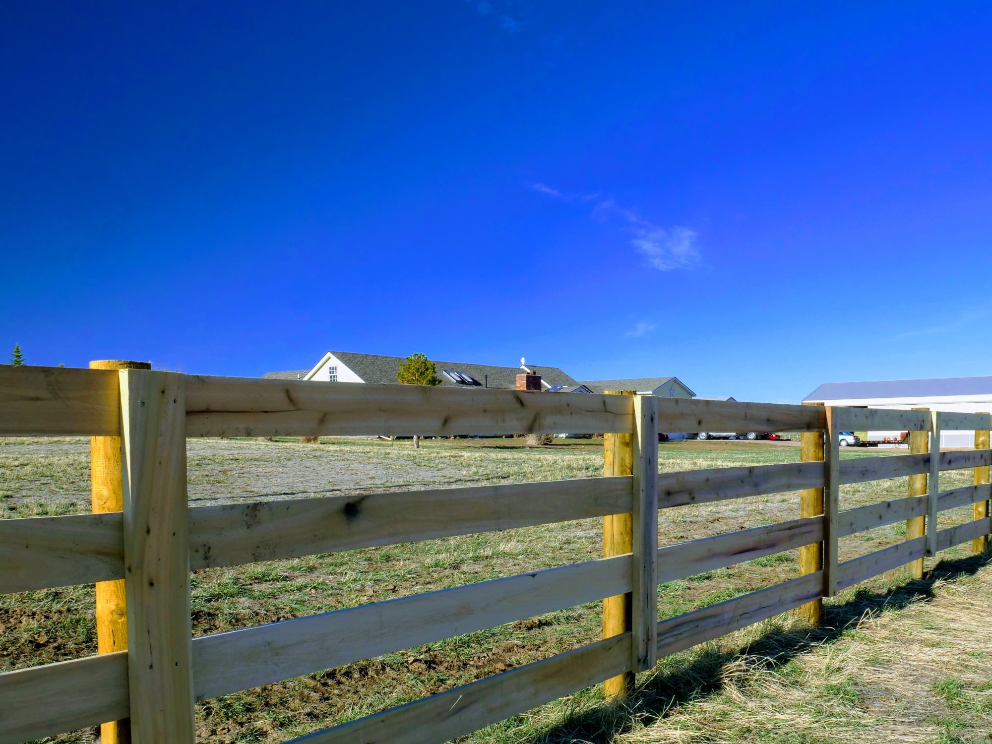 Photo of post and rail wood fence
