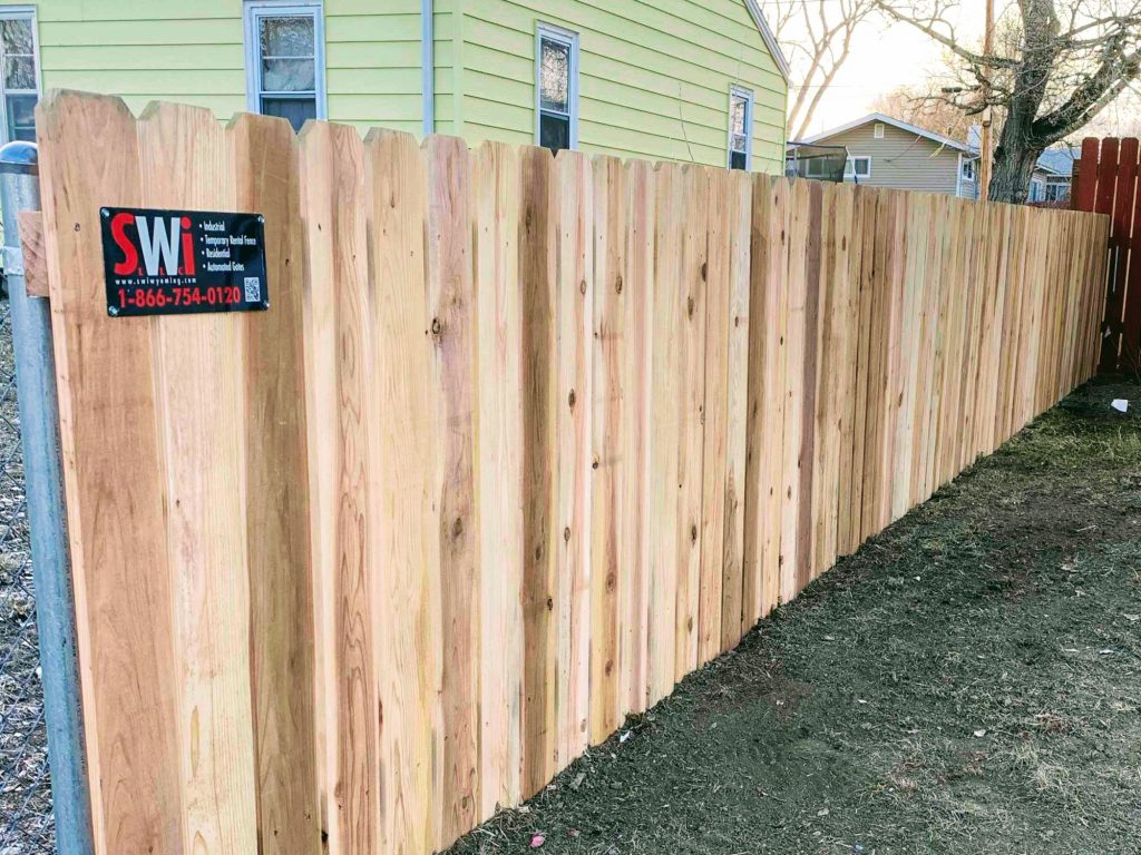 Photo of a privacy side by side wood fence