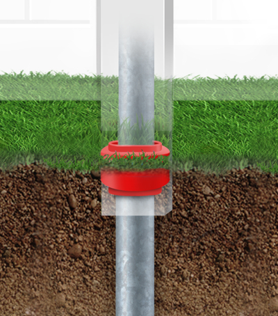 Vinyl fence close up of steel post and donut at ground level